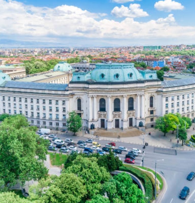Wide aerial shot of The University of Sofia "St. Kliment Ohridski", the oldest higher education institution in Bulgaria. (Bulgarian: Софийски университет "Св. Климент Охридски") . The picture was taken at night with DJI Phantom 4 Pro drone / quadcopter